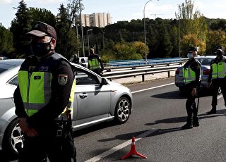restricciones-madrid-punto-control-policia-coronavirus-051020-2-estrecha.jpg